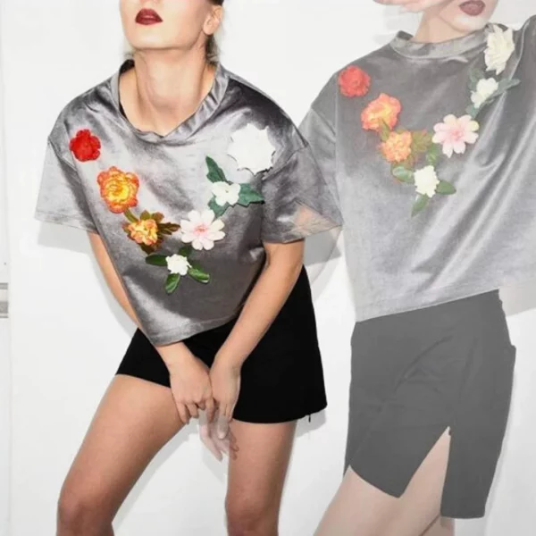 Grey T-shirt with black velcro dots