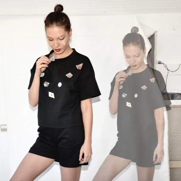 Black T-shirt with white velcro dots
